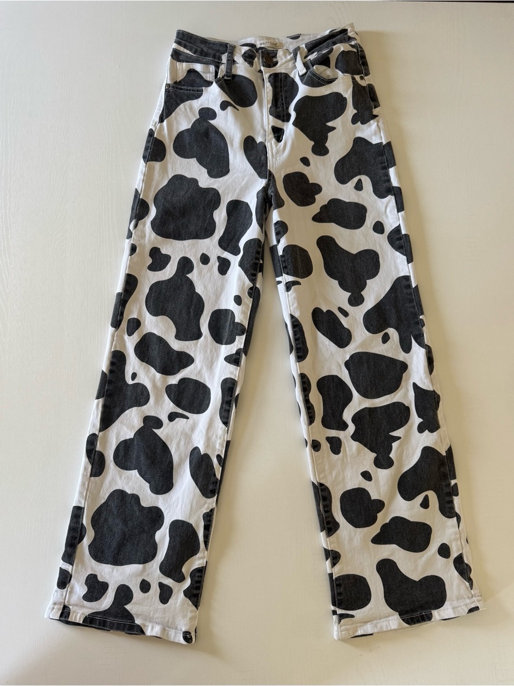 Machine Women’s Flare Jeans in Black & White Cow Print